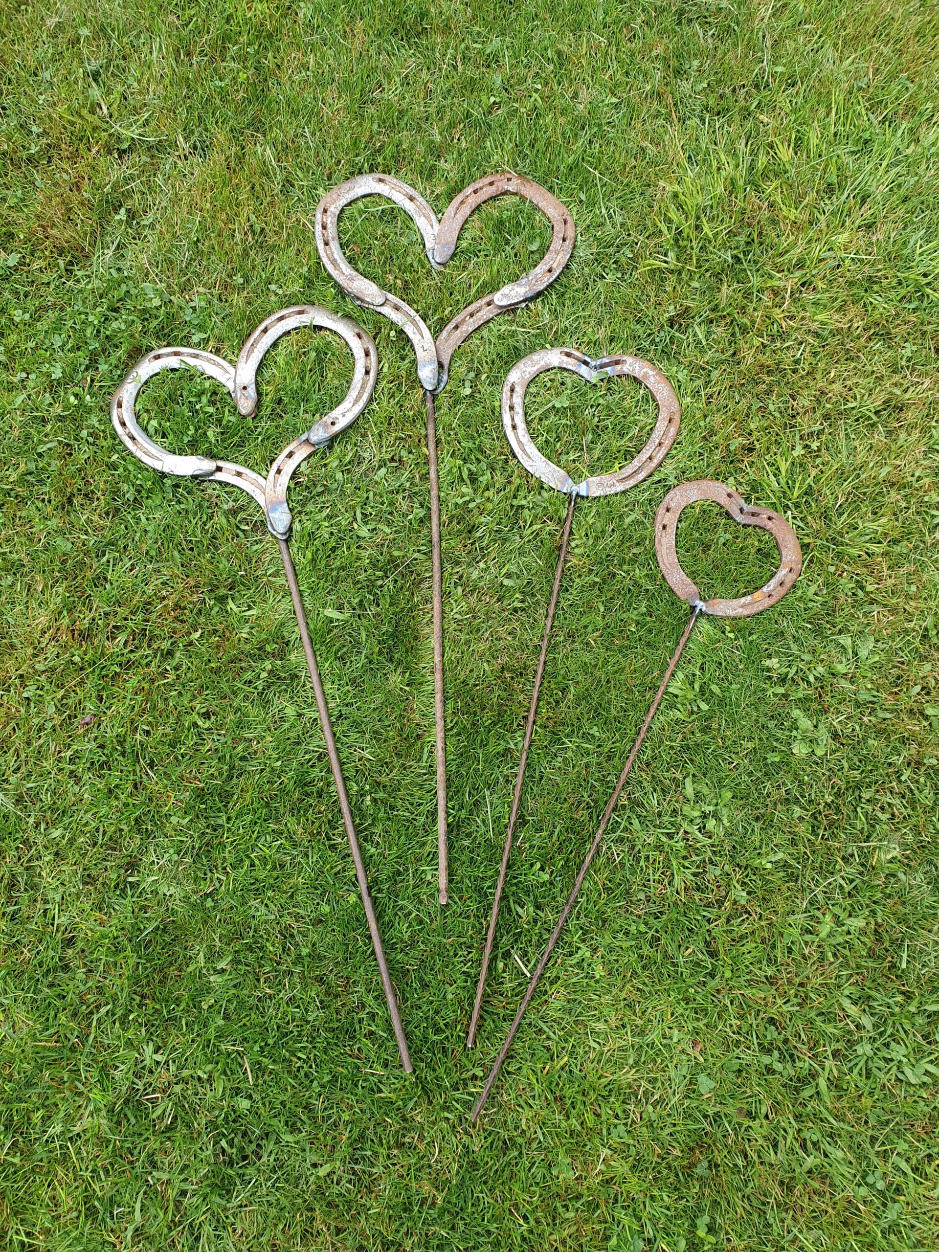 Glücksbringer, Herz aus getragenen Hufeisen...